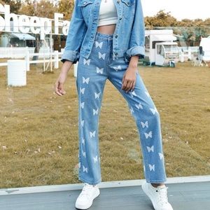 Shein butterfly jeans.